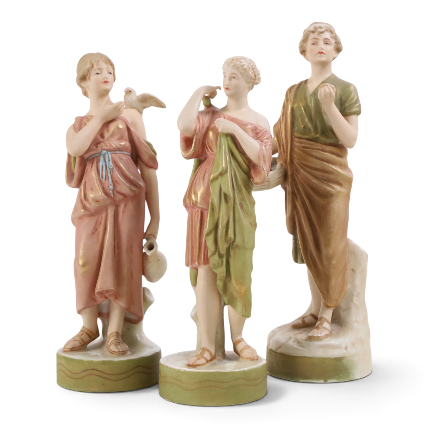 Three Royal Dux figures, Fruit Picker, no. 2082, Lady with Dove, no 2132 and Lady with Shawl no 2133, H23cm