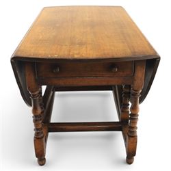 Titchmarsh & Goodwin - 18th century design oak oval drop-leaf dining table with leather dining chairs, the table with drop leaves forming an oval top extending to 180cm, with drawer to either side, raised on turned supports with gateleg, the chairs comprising two carvers in tan leather and two side chairs in green and tan leather backs, brass studded trim with turned uprights and stretchers