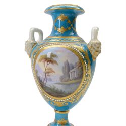 Pair of late 19th century Sevres style vases, each of urn shaped form with twin mask mounted raised handles, decorated with romantic figural and landscape panels within 'jewelled' and gilt foliate borders, with pseudo Sevres marks beneath, H35.5cm