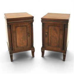  Pair of Regency mahogany bedside cabinets, rectangular top above a central cupboard door ...