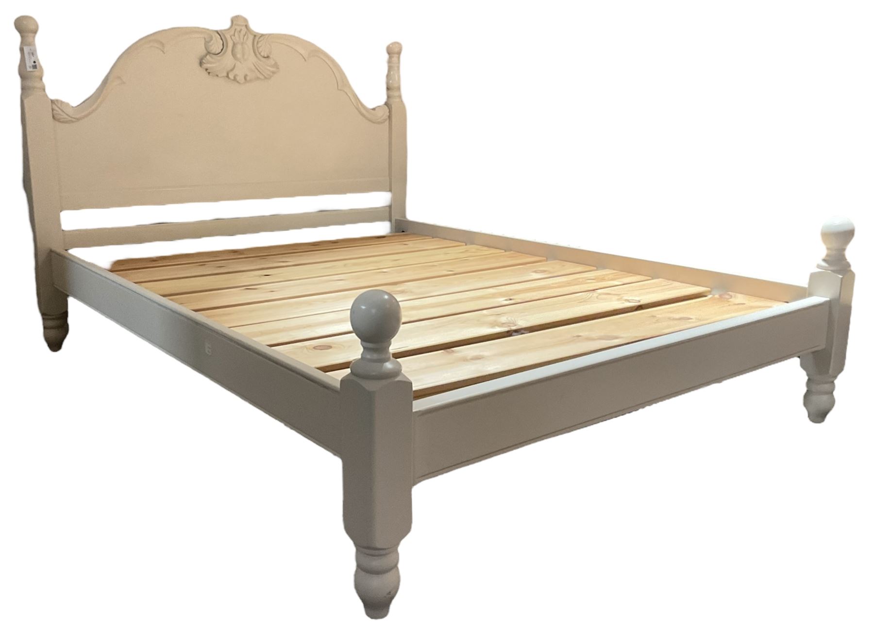 Cream-painted 5' King-size bedstead, shaped headboard carved with foliage cartouche; together with cream-painted bedside table, fitted with single drawer over undertier (W50cm, D40cm, H65cm) 