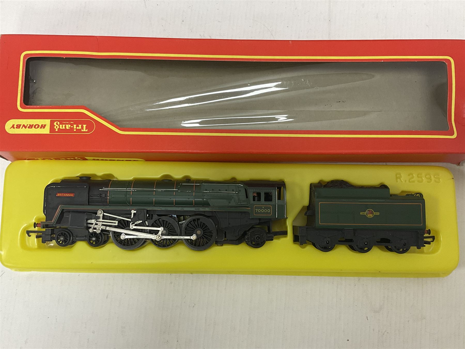 Hornby/Tri-Ang ‘00’ gauge - nine locomotives to include Britannia Class ‘Britannia’ 4-6-2 no.70000 in BR green; Class M7 4-4-0 Tank no.30027 in BR black; Princess Class ‘Princess Victoria’ 4-6-2 no.46205 in BR black; in original boxes; further loose models Princess Class ‘Princess Elizabeth’ 4-6-2 no.46201 in BR green; Class 3F 0-6-0 tank no.7606 in LMS crimson; TR double ended diesel locomotive; three further tank locomotives and one loose tender (10) 