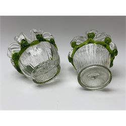 Two 19th century glass flower vases, the clear glass fluted bodies with green glass rim leading to a crown top, largest example H14.5cm. 