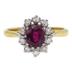Gold oval ruby and diamond cluster ring, stamped 18ct Plat, ruby approx 0.70 carat