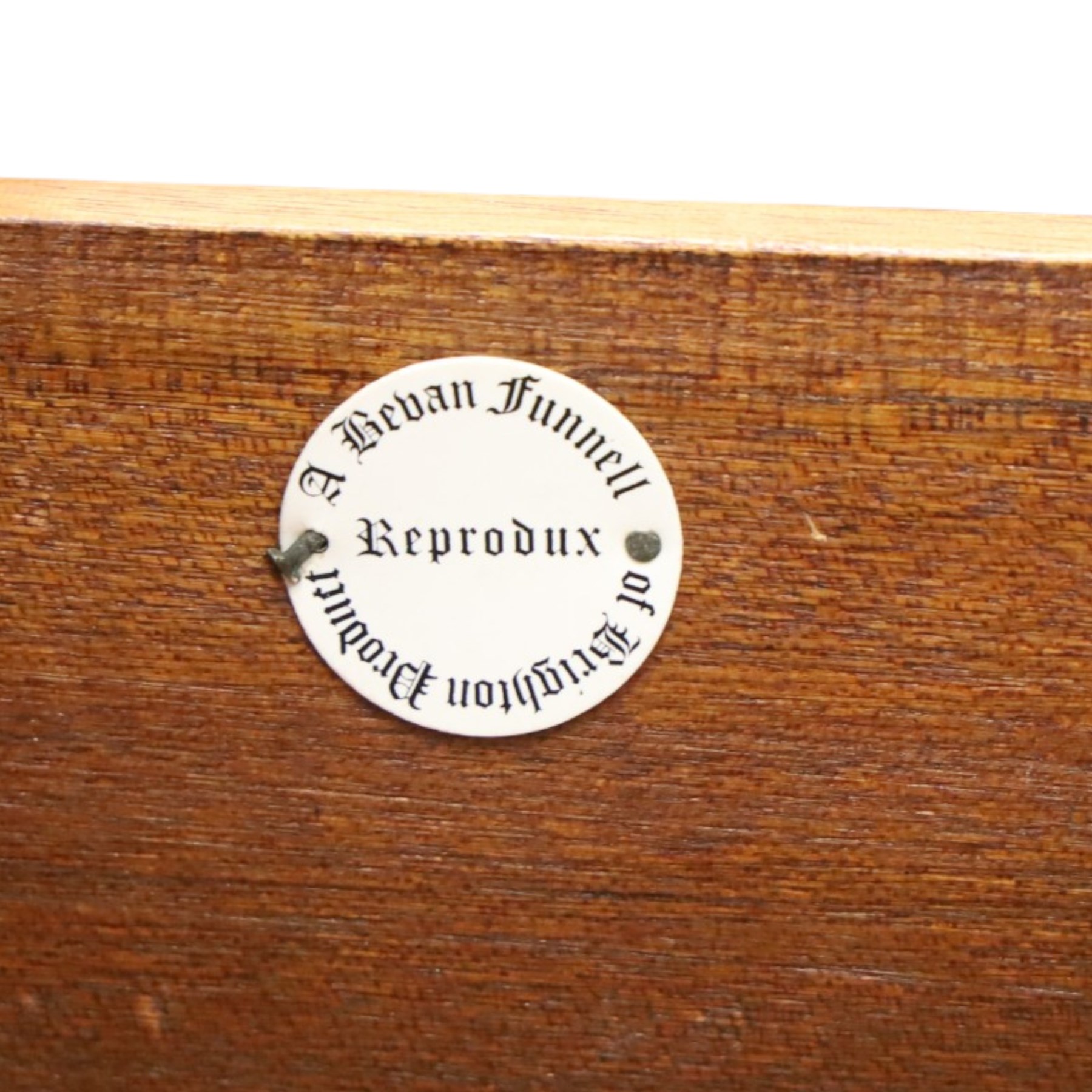 Reprodux - Georgian design figured and burr walnut bachelors chest, rectangular hinged-fold over top with reeded edge supported by stays, over four long graduating cock-beaded drawers, lower moulded edge on bracket feet