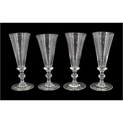 Near set of four early 19th century ale glasses, the funnel bowls upon collars, knopped stems and circular feet, each approximately H15cm