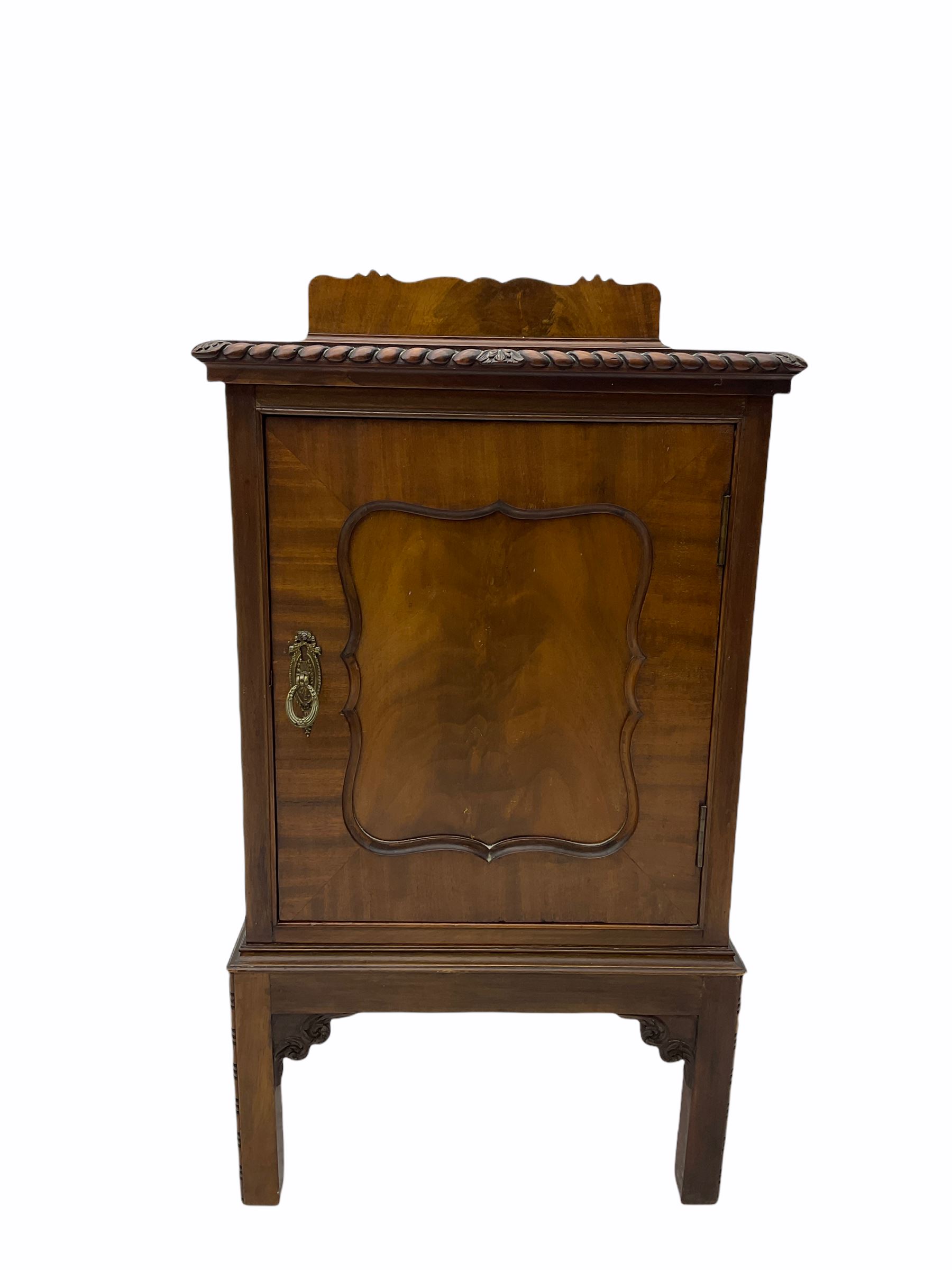 Early 20th century mahogany bedroom suite - dressing table (W122cm, H161cm, D56cm), chest (W107cm, H125cm, D51cm), and bedside cupboard (W44cm, H80cm, D44cm)