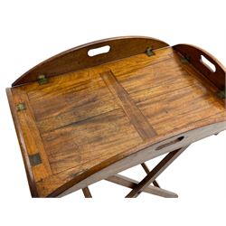 George III mahogany butler's tray on stand, the panelled tray with hinged sides pierced with handles, on folding stand