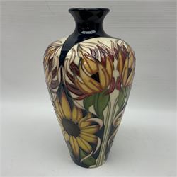 Moorcroft Sunflower vase, 2018 trial, of baluster form with fluted rim, tubelined and painted with sunflowers, on a cobalt blue ground, impressed and painted marks beneath, H23.5cm