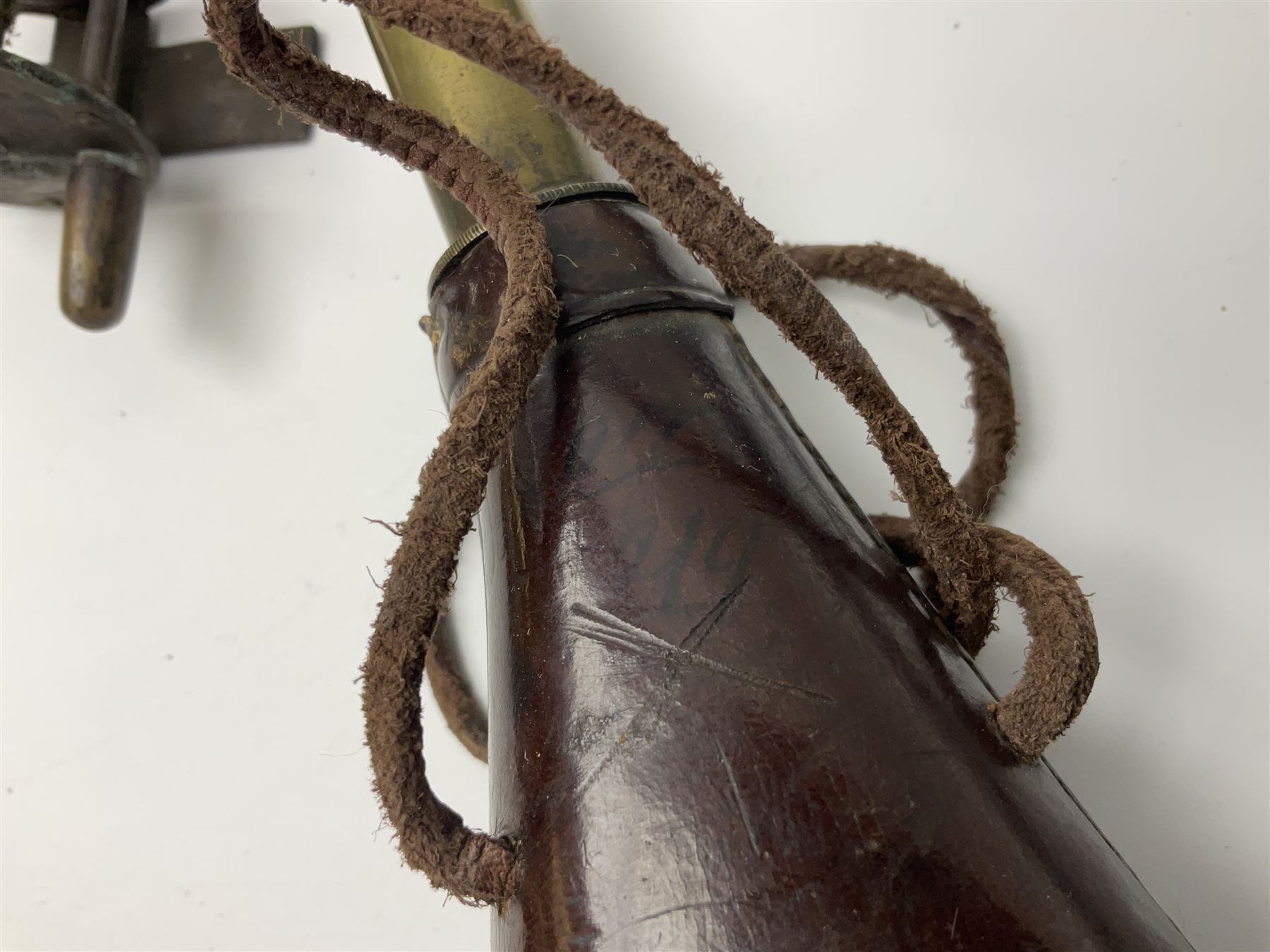 Six early 20th century fishing reels, to include wooden and brass examples, together with a leather powder flask, 1913 Christmas tin, Morgan dollar, Queen Victoria double florin and a collection of other coins, etc 