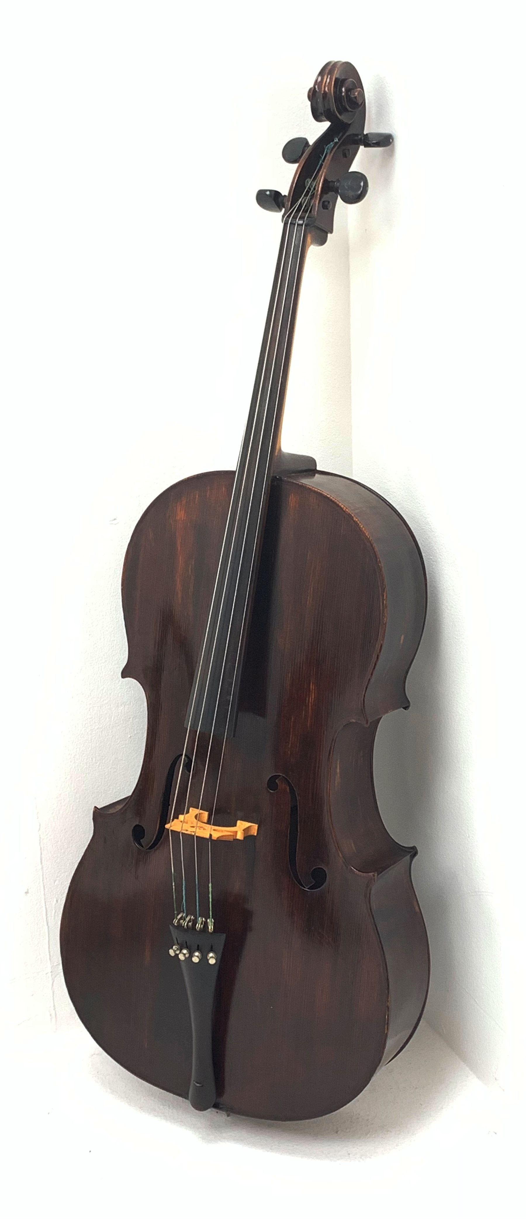  Early 20th century French Mirecourt cello with 76cm two-piece maple back and ribs and spruce top, bears label Michel-Ange Garini L123cm, in modern quality soft carrying case  