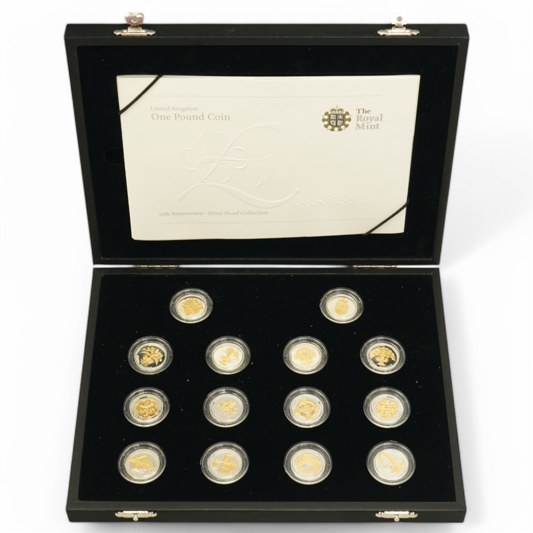 The Royal Mint United Kingdom silver proof 'One Pound Coin 25th Anniversary' fourteen coin collection, cased with certificate
