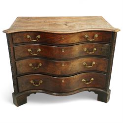 George III Chippendale period mahogany serpentine-fronted chest, shaped top with moulded e...