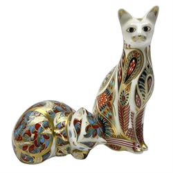 Two Royal Crown Derby paperweights, comprising siamese cat and recumbent kitten, both with gold stoppers and printed mark beneath, tallest H13cm