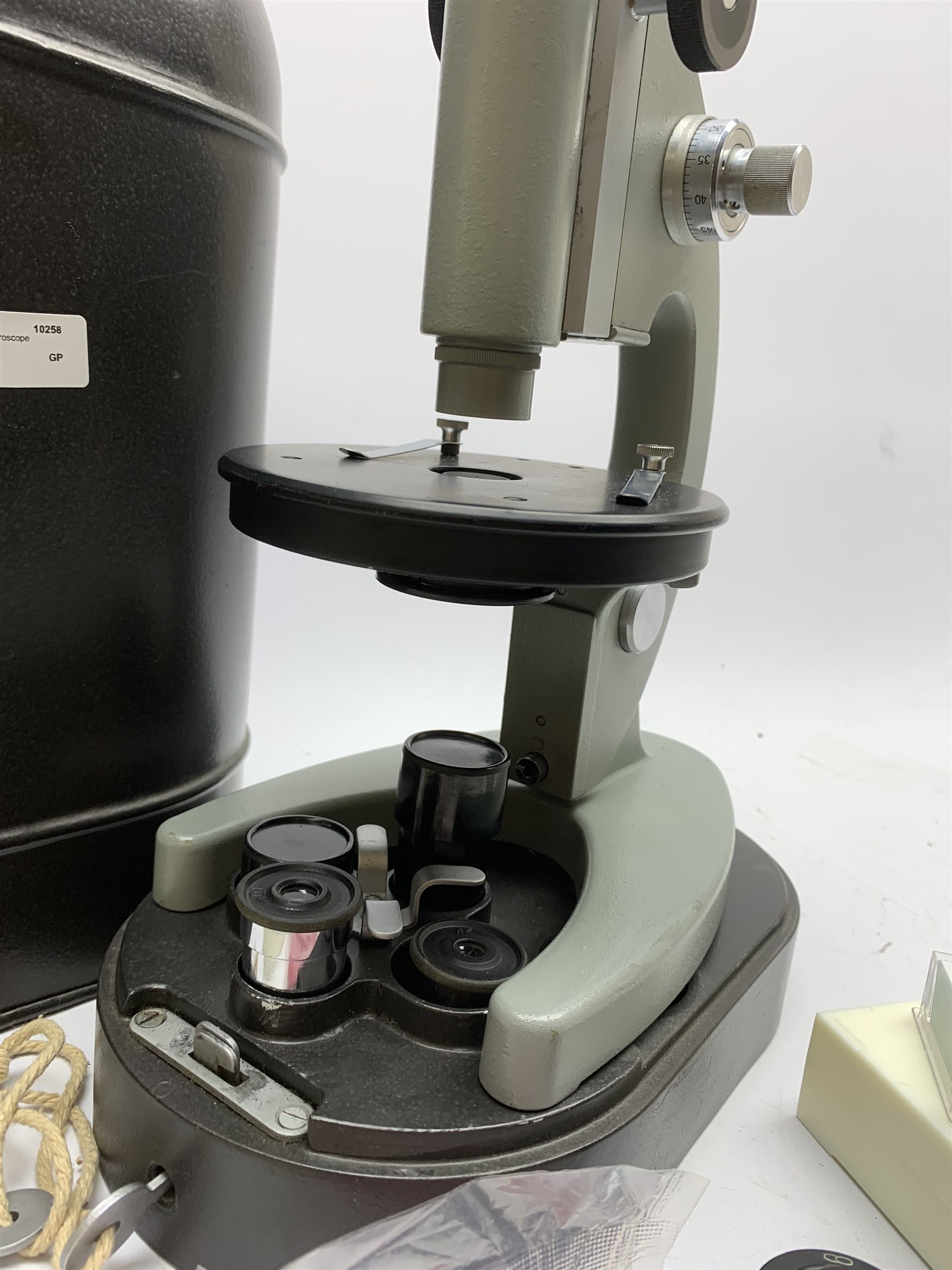 20th century Russian biological simplified monocular microscope, black and grey metal with rack and pinion focusing, in metal case with two additional lenses, instructions dated 1978 etc H34cm