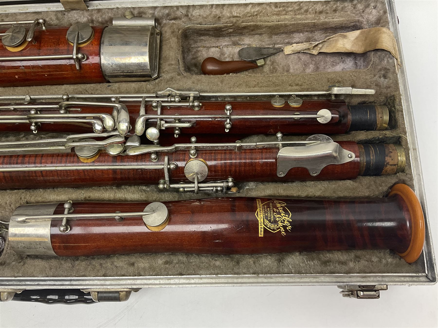 Schreiber & Sohne four-piece bassoon, serial no.9614; in fitted case with two crooks.