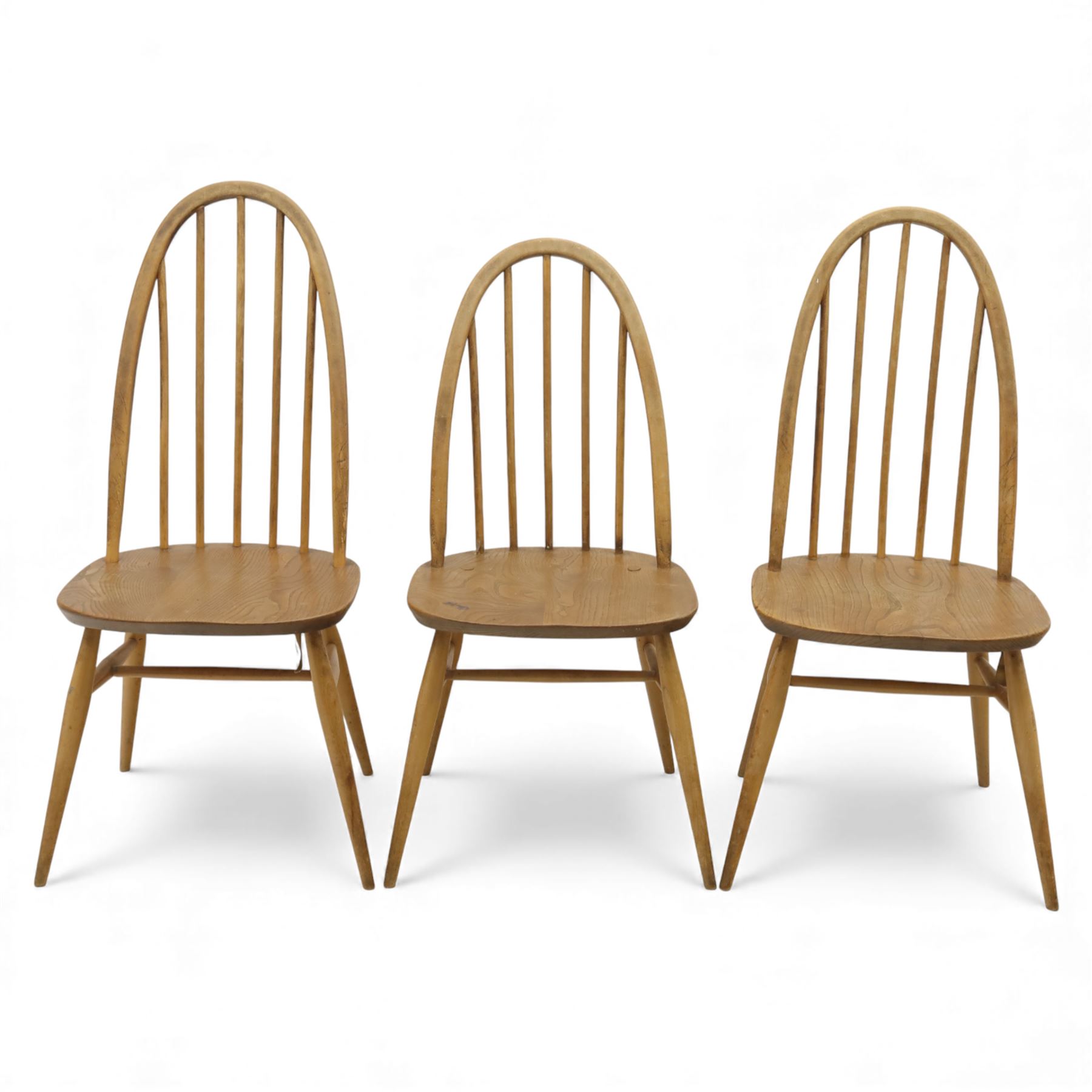 Ercol - set of three Quaker back dining chairs, two tall and one smaller hoop backed chairs