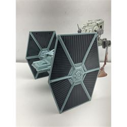 Star Wars - four space/land vehicles comprising Millenium Falcon with hinged top and figures; TIE Fighter; X-Wing Fighter with pilot; and AT-ST 'Chicken Walker' transporter; all unboxed (4)