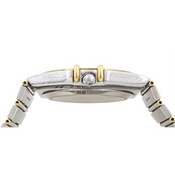 Omega Constellation gentleman's stainless steel and gold automatic chronometer wristwatch, Ref. Cal. 1111, serial No. 49547890, white dial with date aperture and exhibition back case, on integral bracelet No. 1448.5/431, with fold-over clasp