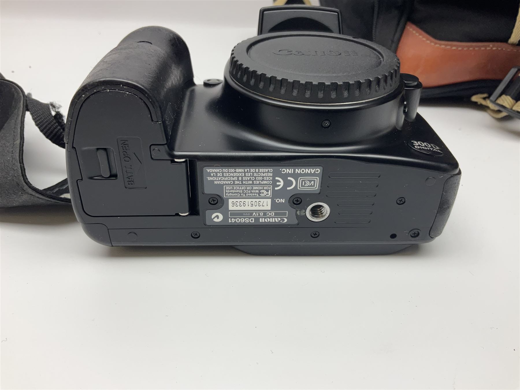 Four camera bodies, to include, Ricoh KR-10 serial no. 38826, Pentax MZ-M serial no. 4185969 with 'SMC Pentax- M 1:3.5 28mm' lens, Canon EOS500 serial no. 080927, with 'Sigma Zoom 100-300mm 1:4.5-6.7 DL'  lens etc, with other camera lenses and equipment 