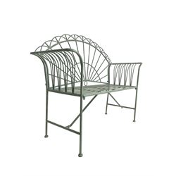 Regency design wrought metal bench, the fan back over out-swept arms, strap seat on supports united by stretchers, in pale teal finish