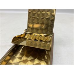 Art Deco camera shaped lady's musical compact and cigarette case, probably German, with green marble effect panels and gilt highlights, with large hinged opening to reveal engine turned brass interior with cigarette or lipstick holders, and the other side with musical mechanism and flip action powder compartment with mirror, L10cm