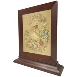 Victorian mahogany fire screen, the tapestry panel depicting peacock and flowers