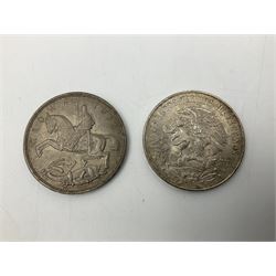 Two United States of America silver Morgan dollars dated 1885 O, 1888 O, King George V 1935 crown coin, and Mexico 1968 twenty-five pesos coin