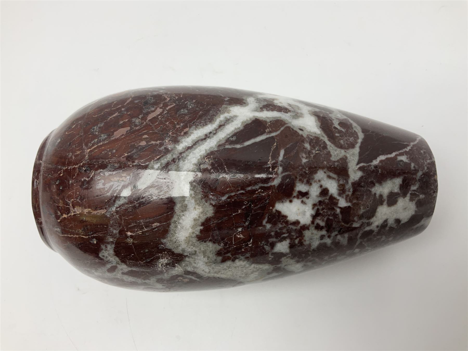 Red marble vase, of baluster form, H18cm
