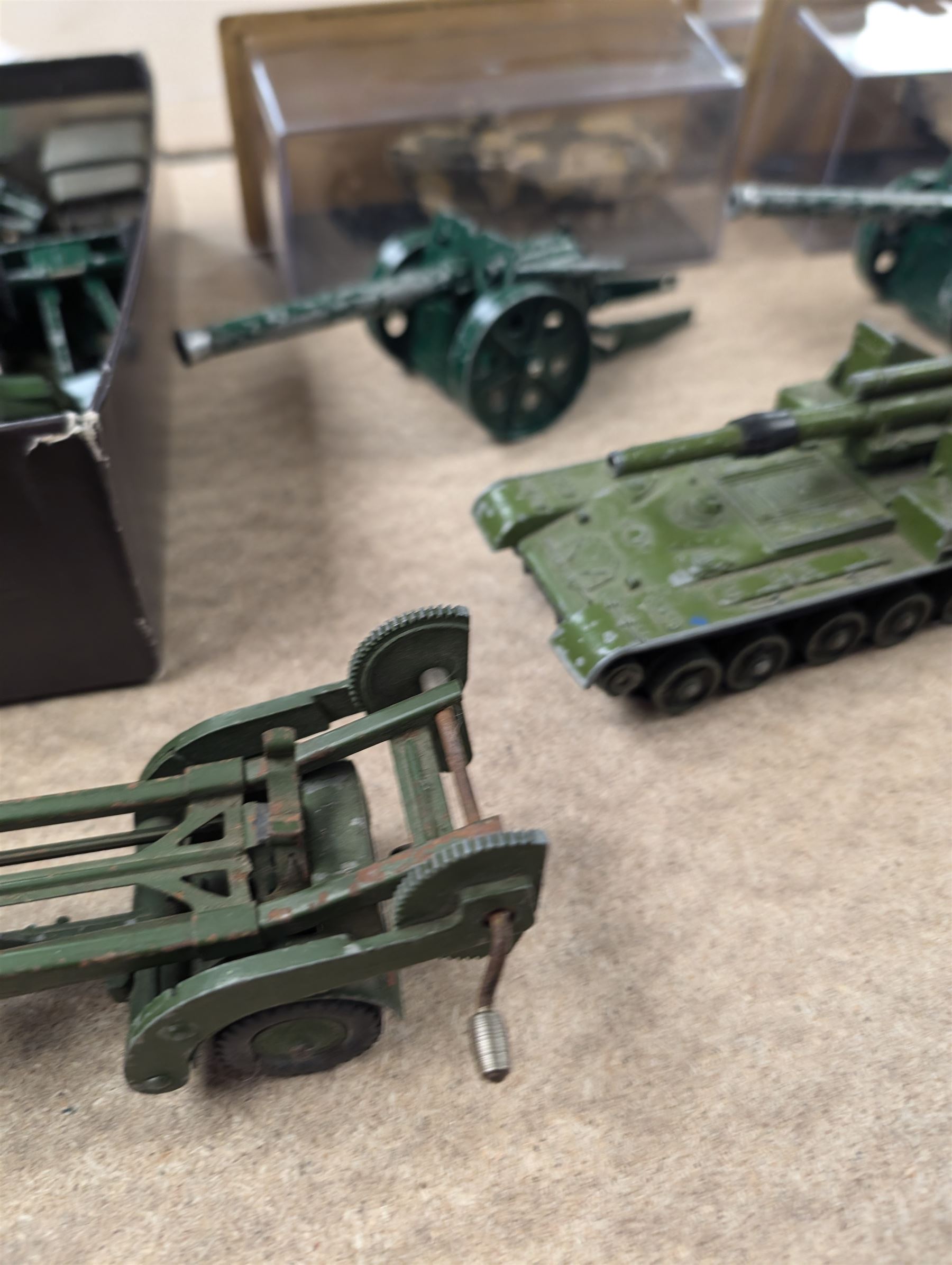 Collection of diecast military vehicles, including Dinky, Matchbox and Solido examples, mostly unboxed tanks