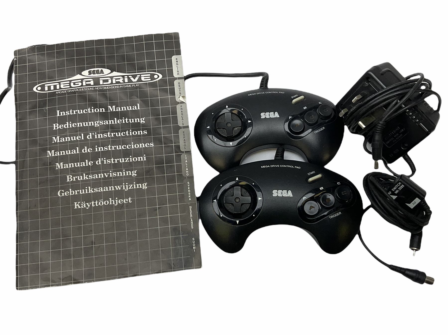 1990s Sega Megadrive 16bit games console with five games comprising Sonic the Hedgehog, Fifa International Soccer, Mickey Mouse Castle of Illusion, MicroMachines 2 Turbo Tournament and 1994 Lillehammer Winter Olympics, boxed with instructions