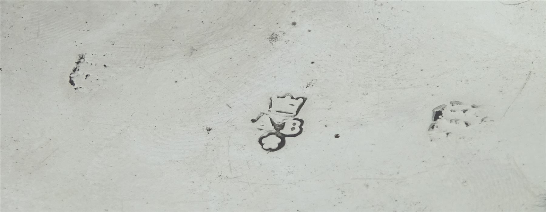 Queen Anne silver tankard, of plain tapering cylindrical form, with stepped and flat-domed cover, twit cast thumbpiece and curved handle, the body engraved with eagle crest, hallmarked Abraham Barachin, Hull, circa 1706, the body and cover stamped once with makers mark and twice with town mark, H18cm, approximate weight 21.46 ozt (667.7 grams)
