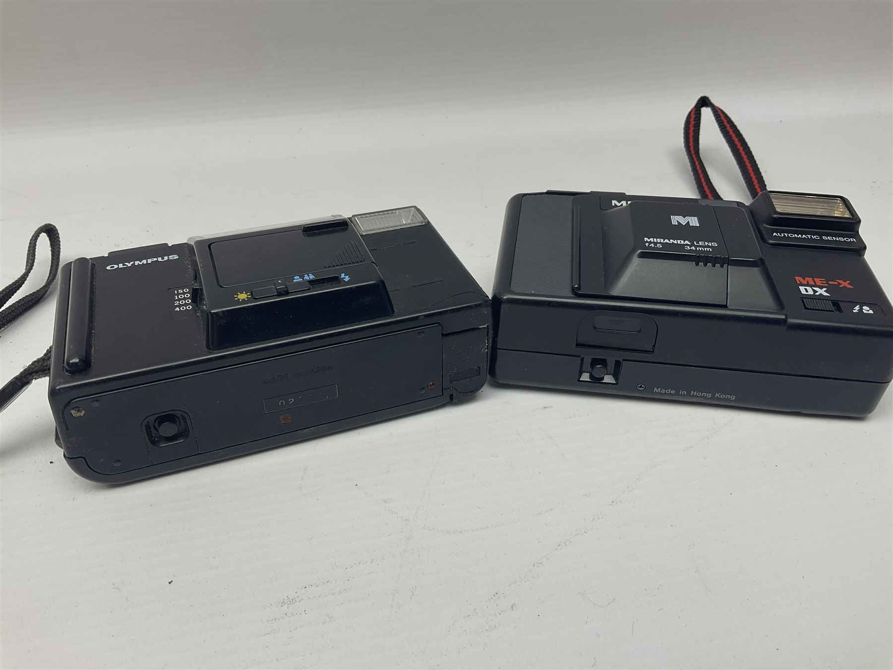 Four Olympus cameras, to include AF10 Super, XA2, Shoot & Go and Supertrip examples, together with Miranda ME-Z and Miranda ME-X DX cameras, an Agfa Optima camera with Agfa Paratonic DIN ASA Solitar 1:2.8/40 lens, Canon Snappy S camera and a Fujifilm Fine Pix S5700 camera, serial no 7WE12368 (8)