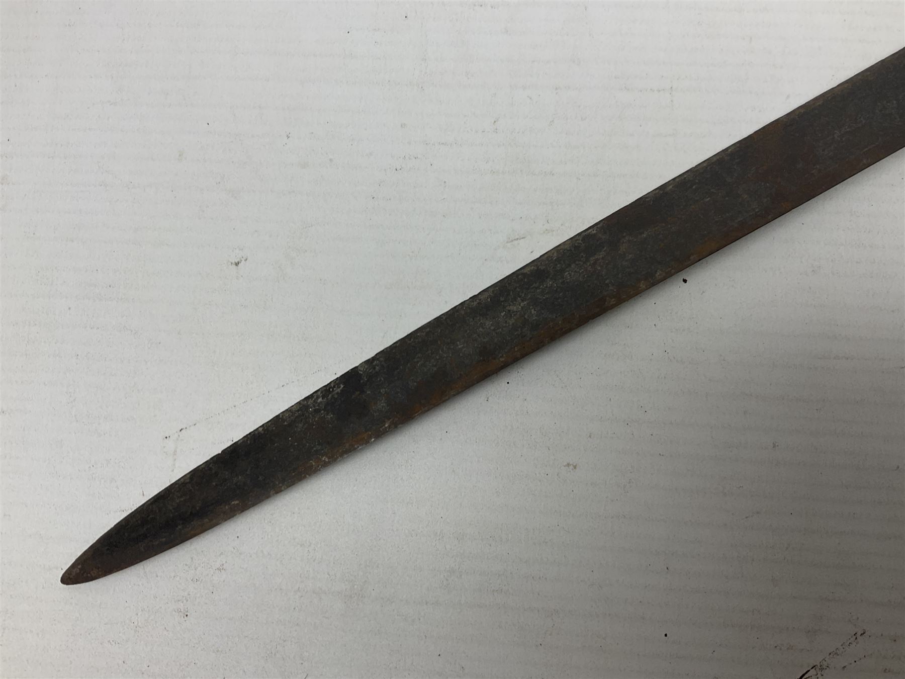 Victorian 1845 pattern infantry officer's sword the 82cm sharpened fullered steel blade with traces of decoration, brass gothic hilt incorporating Victorian cypher, folding back guard, stepped pommel with acanthus leaf backstrap and wire-bound wooden grip with traces of original fish skin covering L96cm overall; together with a reproduction Scottish style basket hilted sword; both lacking scabbard (2)