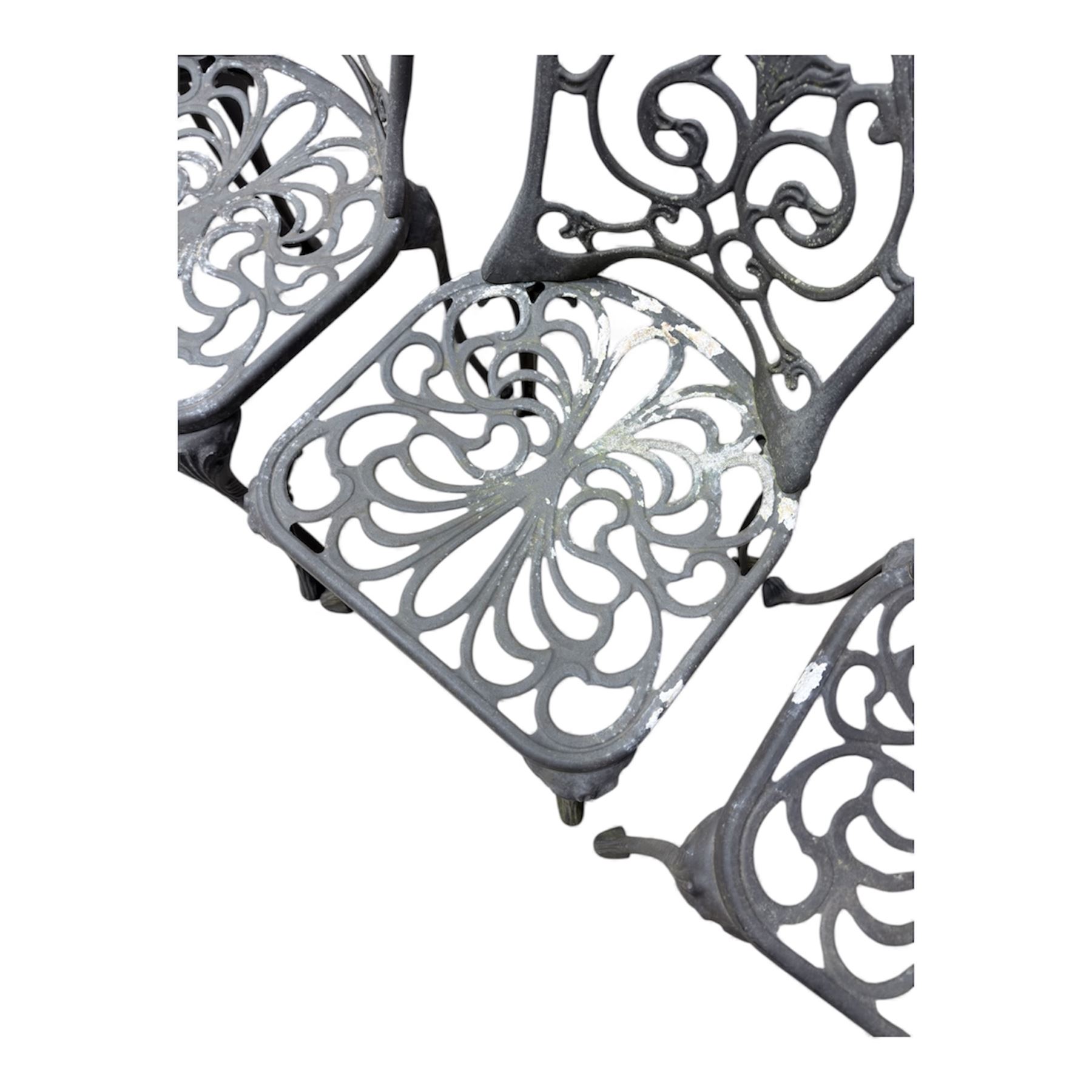 Cast aluminium garden table and four chairs in dark grey