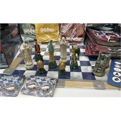 Complete DeAgostini Harry Potter chess step by step course with accessories, wand etc, including periodicals Nos. 1-82 (lacking No.68) with four binders, two chess sets with framed board, one traditional style the other fantasy, in original box.
