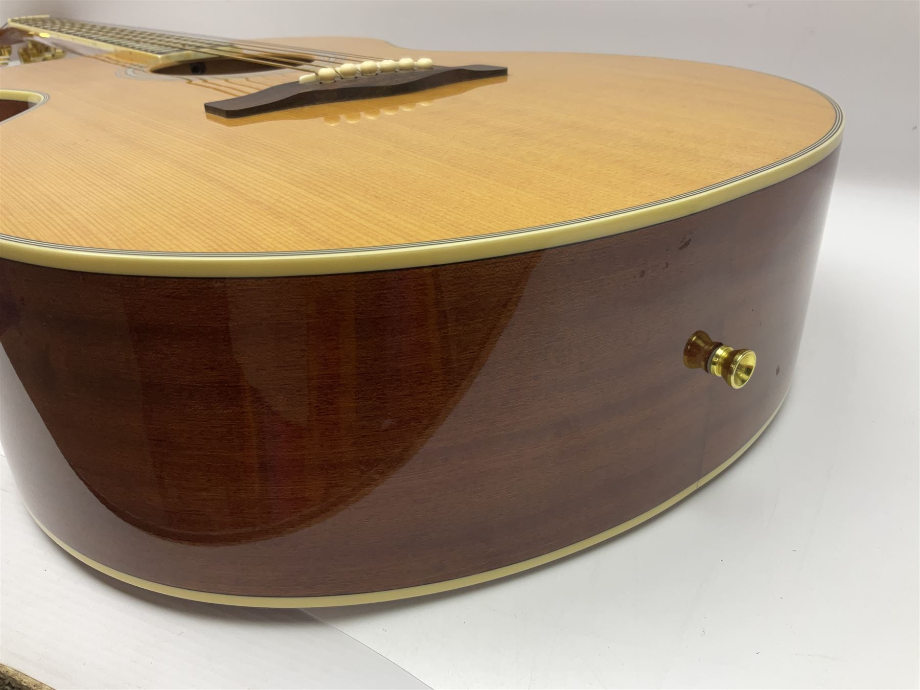 Woodstock model no.WHW41J203 acoustic guitar with mahogany back and sides and spruce top, serial no.2835 L102.5cm; in soft carrying case