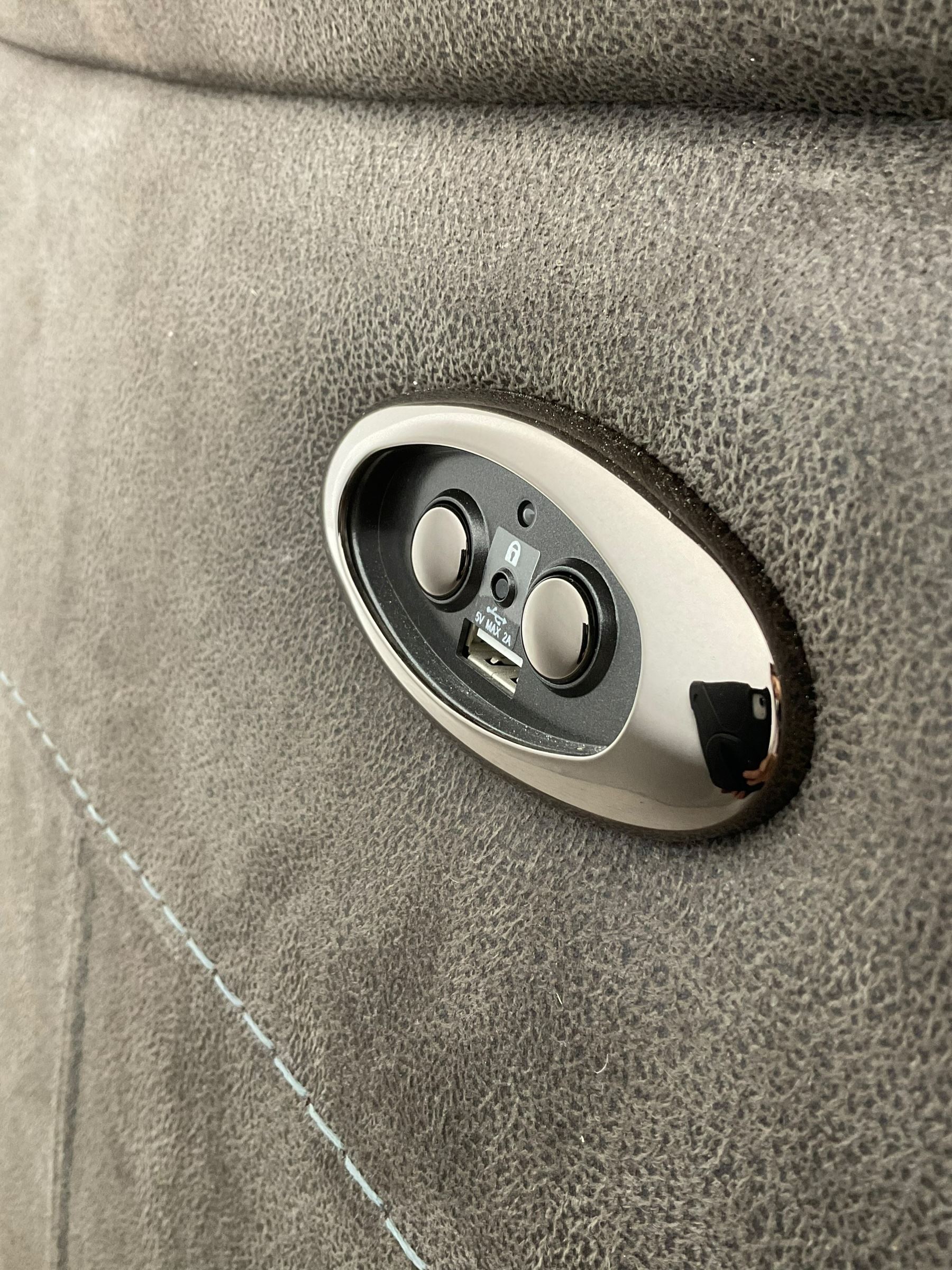 DFS - 'Vinson' grande four-seat electric reclining smart sofa upholstered in stitched grey fabric, each seat with independent electric reclining action, fitted with two USB charging ports 