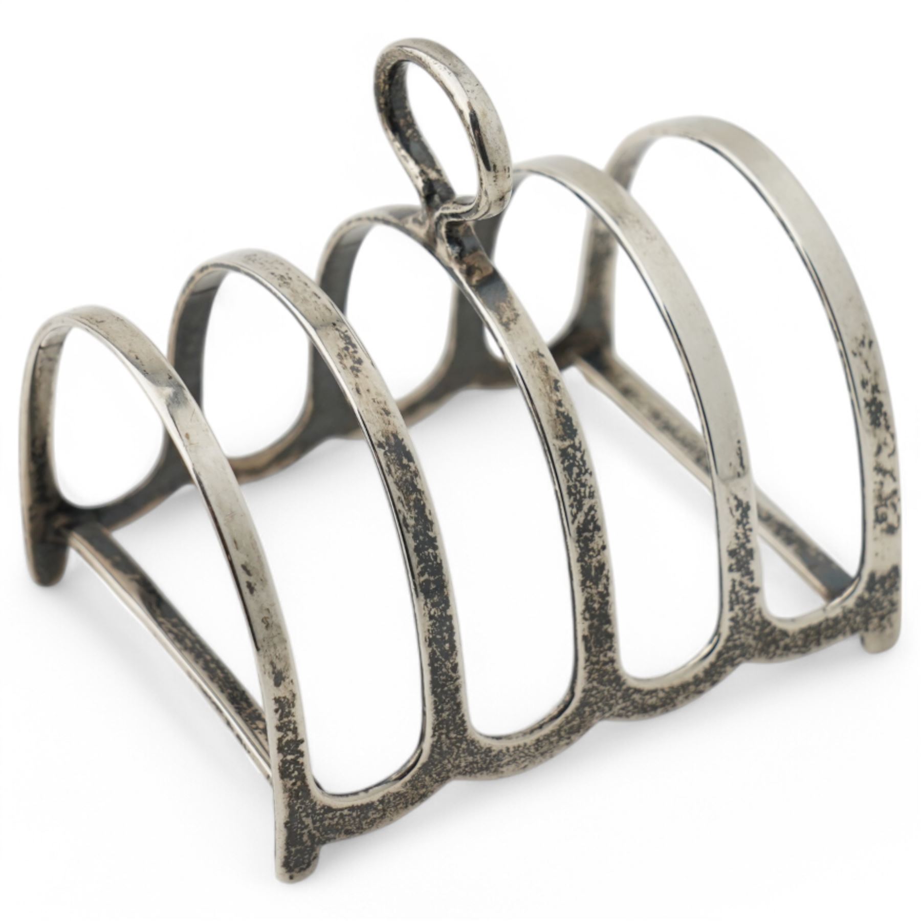 George III silver wine funnel London 1818 Maker William Bateman I, small silver four division toast rack, shell butter dish and two condiments 