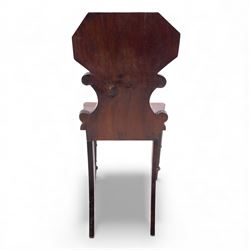 Pair of 19th century mahogany hall chairs, each with shaped octagonal backrest featuring a recessed cartouche panel, serpentine supports and moulded seat, raised on turned front legs
