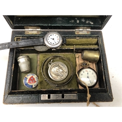  Victorian leather jewellery box containing a 19th centuries Ladies pocket watch, thimbles etc, brass matchbox holder marked souvenir de France with a cartouche featuring a pickel hanbe helmet to the front, collection of cap badges, horn carved whistle, marble paperweight with Lloyds bank monogram in gilt and miscellanea   