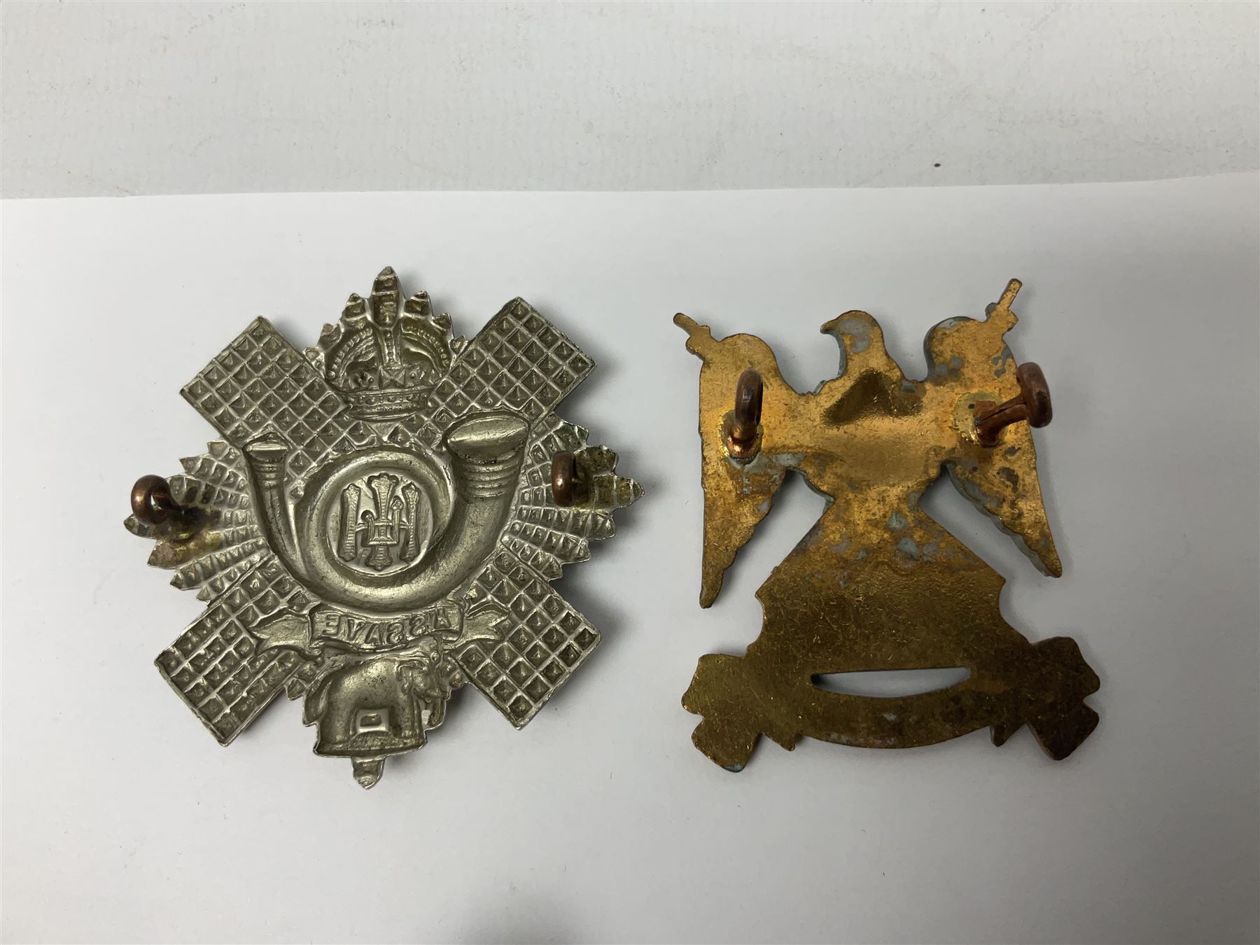 Fifteen Scottish Glengarry and other metal military badges including Argyll & Sutherland, Royal Glasgow Yeomanry, Cameronians, Lanarkshire Yeomanry, Kings Scottish Own Borderers, Highland Light Infantry, Border Regiment, Lowland Regiment, Lothians & Border Horse Yeomanry, Ayrshire Earl of Carricks Own Yeomanry etc