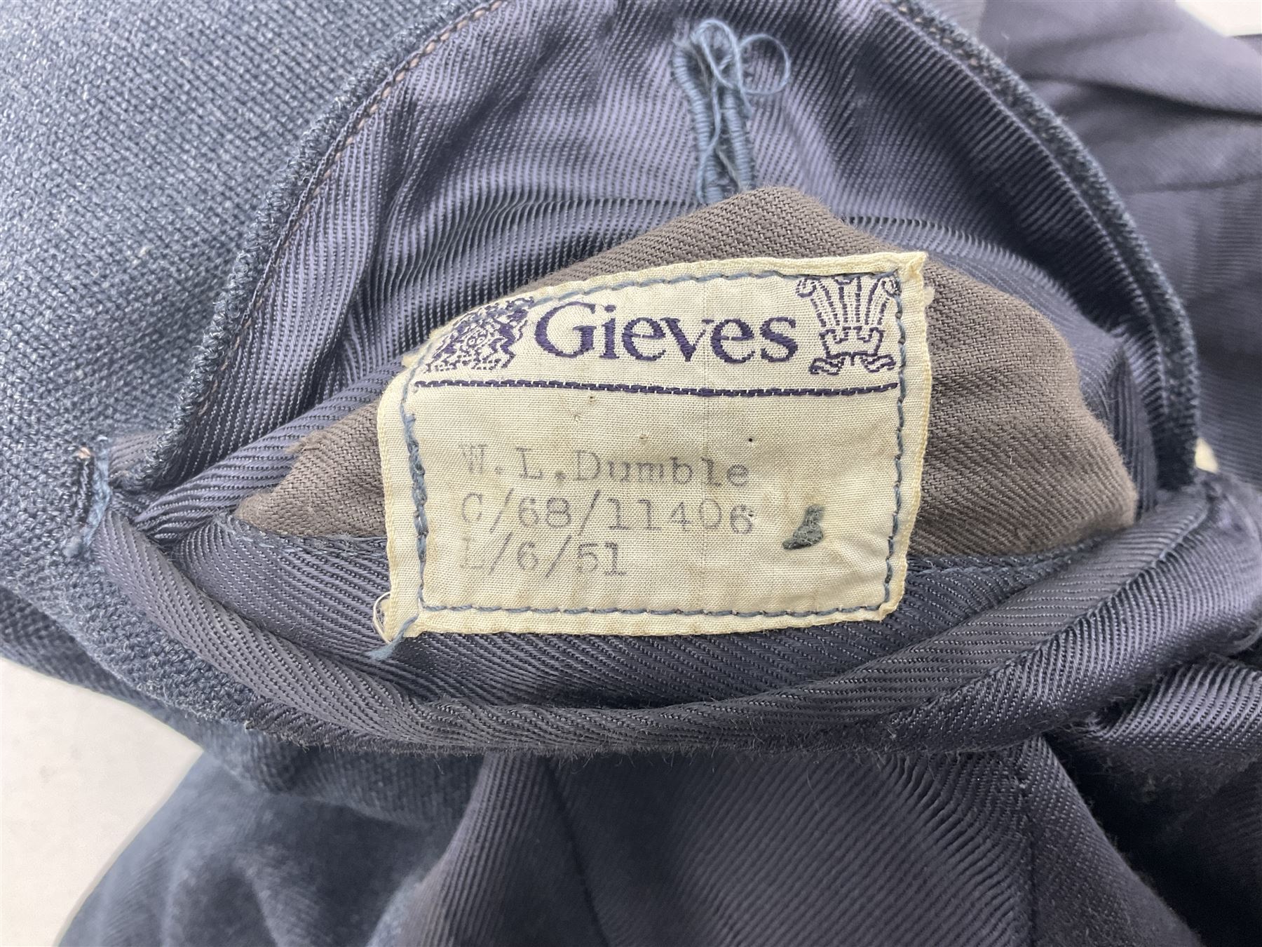 RAF pilot officer's tunic, bears Gieves label 'W.L. Dumble C/68/11406 L/6/51'