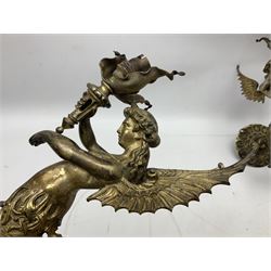 Pair of continental brass wall lights, each in the form of a siren, a mythological winged sea creature, holding a flaming torch H30cm