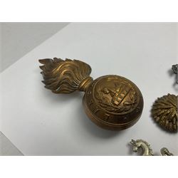 Nineteen Yeomanry metal cap badges including Derbyshire, Northamptonshire, Essex, Glamorgan, Staffordshire, City of London, Surrey, Shropshire, Hertfordshire etc; together with eleven Fusiliers badges including Lancashire, Royal Welch, Northumberland etc (30)