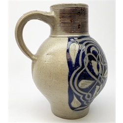 An 18th century Westerwald stoneware flagon, the bulbous body with moulded GR Royal cypher beneath a crown, and further detailed with incised foliate decoration, H25cm. 