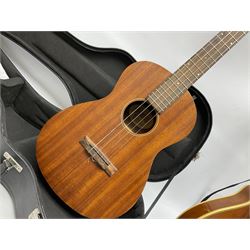 Palmer eight-string mandolin with mahogany back, simulated ivory and mother-of-pearl mounts L67cm; and Mahalo mahogany cased baritone scale ukulele, model no.U320B, L76cm; in hard carrying case (2)