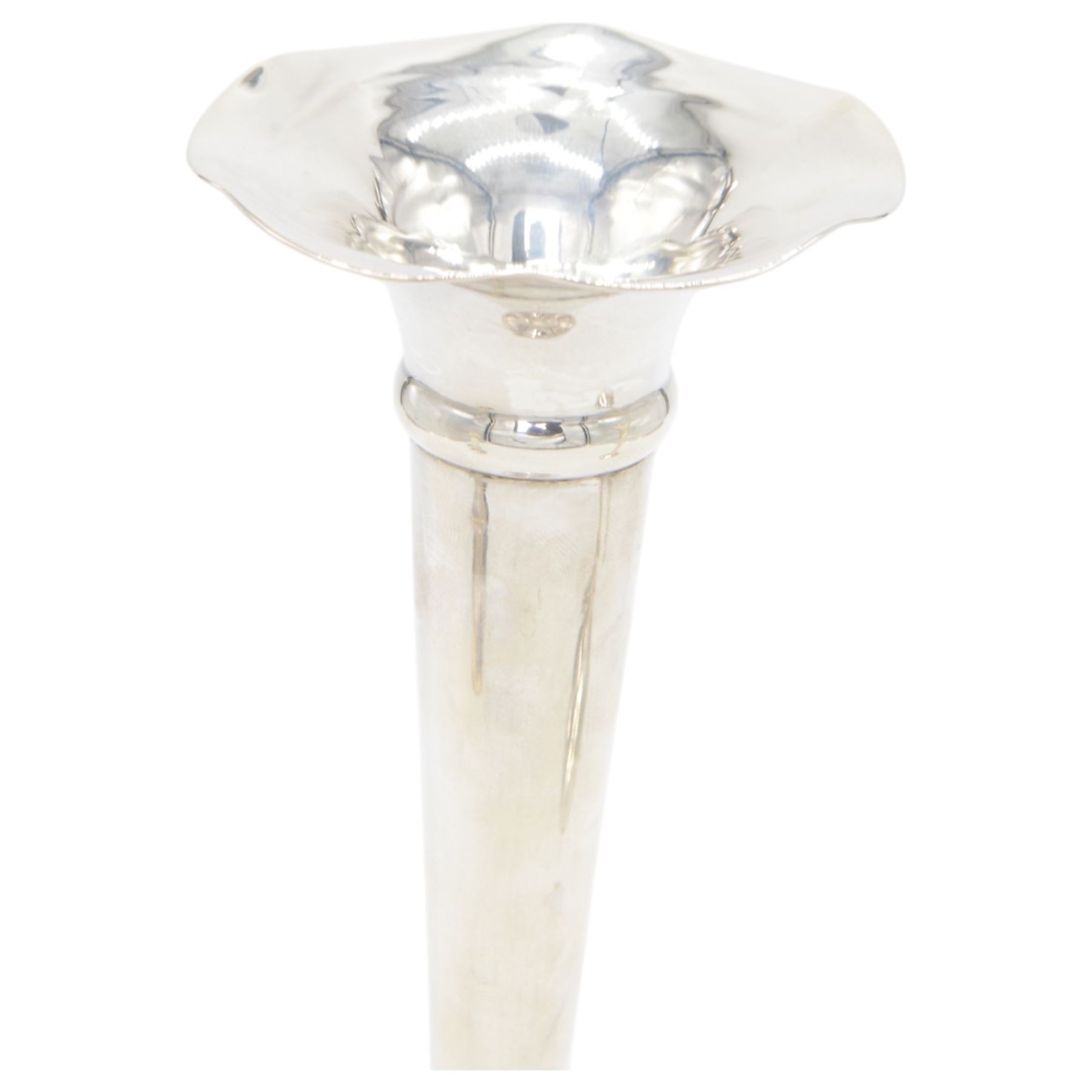 Two pairs of early 20th century silver vases, comprising pair of Edwardian trumpet vases with fluted rims upon a circular domed foot, hallmarked S Blanckensee & Son Ltd, Chester 1907, and a smaller 1920s pair, hallmarked Chester 1920, maker's mark worn and indistinct, tallest H19cm