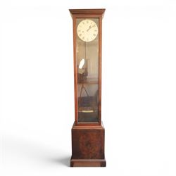 Edwardian mahogany regulator longcase clock, retailed by Maple & Co. Ltd., London, moulded cornice over glazed case enclosing a circular painted Roman numeral dial, single train weight-driven movement with brass cased weight and pendulum, on plinth base