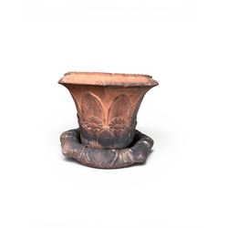 Small 19th century terracotta octagonal planter with stand, flower and leaf design